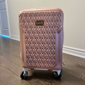 Pink Bebe carry on luggage